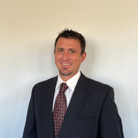 Evan Lausier in a suit